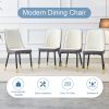 Table and chair set.63"W x 37"D x 30"H Black Marble MDF DiningTable Set with 4 White and Dark Gray spliced PU Chairs with black metal legs.Bring a com